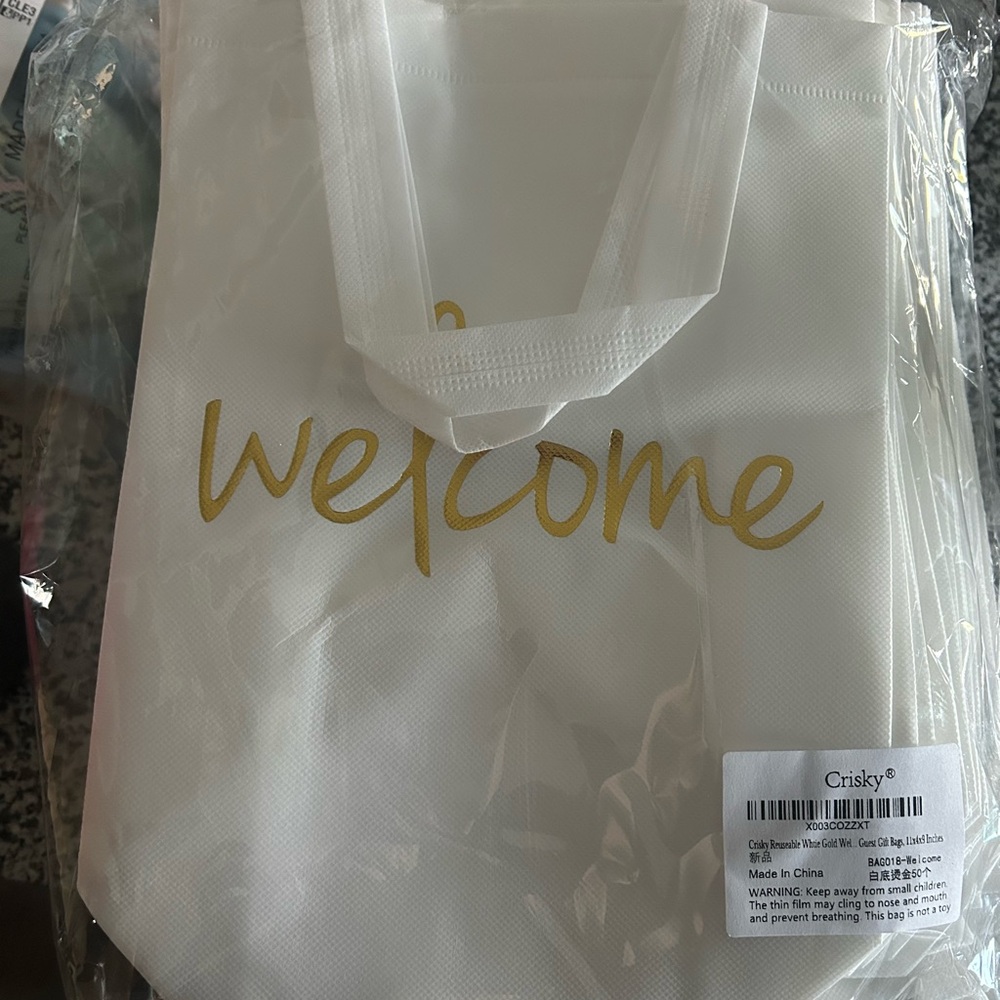 White Tote Bag with Gold Welcome Print